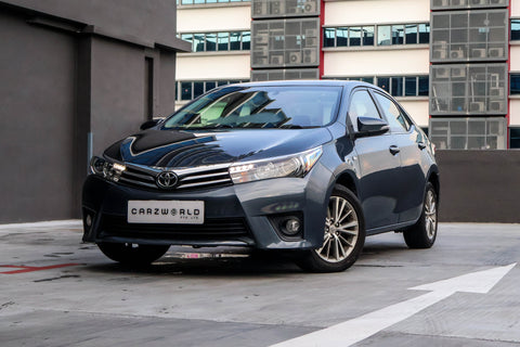 Used Toyota Corolla Altis 1.6L CVT 2015, blue color, well-maintained exterior, for sale singapore